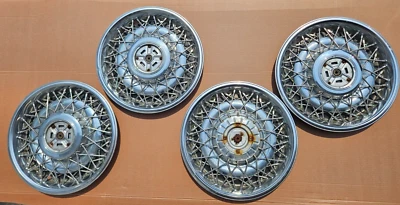 Juego de tapacubos de cable (4) Cadillac Deville Brougham 1975-1989 tracción trasera 15 pulgadas Foto 1 de 4