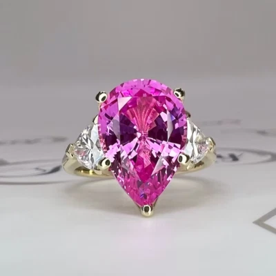 Alianza de oro amarillo sólido de 18 quilates con zafiro rosa natural y diamantes de 4,80 quilates Foto 1 de 4