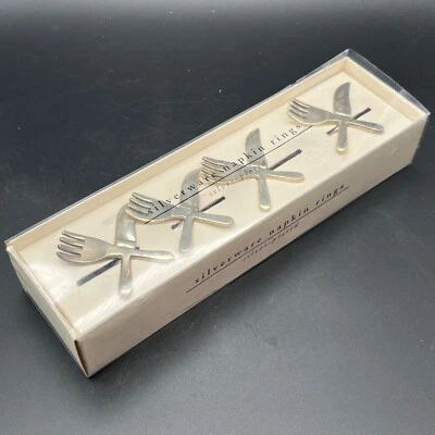 Pier 1 Imports Silver Plated Napkin Rings Crossed Knife Fork Set of 4 Boxed - Image 1 of 4