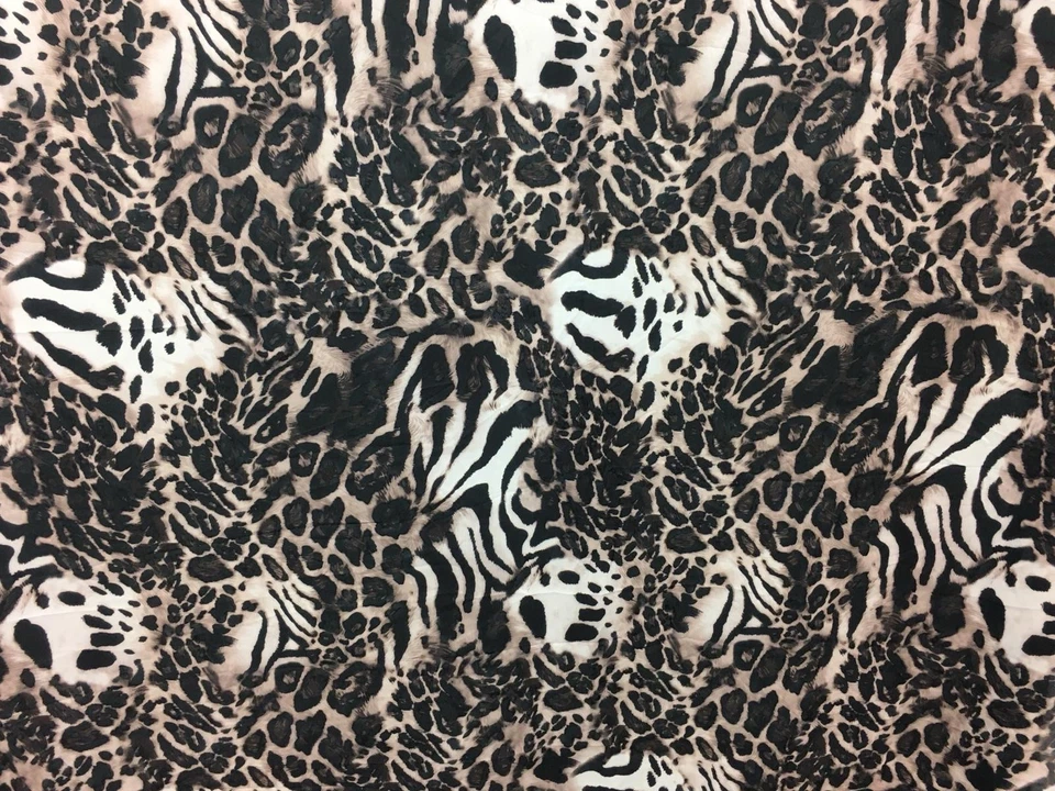 Tela de vestir de gasa con estampado de leopardo 150 cm de ancho Foto 1 de 1