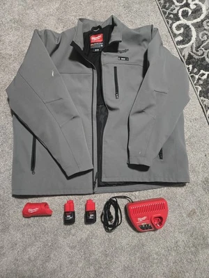 Milwaukee 3X M12 Heated Coat with 2 Batteries, m12 Charger, and m12 Topoff unit - Image 1 of 4