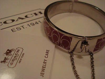 BRAZALETE BRAZALETE LINDO COACH FX (FUCSIA/ROSA) FIRMA CON BISAGRAS "C" - F99679  Foto 1 de 4