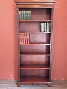 A classic Georgian style 20th c tall floor standing open book case in mahogany