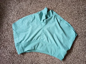 Athleta Run With It 3,5 Shorts, Gr. M, grün gefüttert, Reißverschlusstasche hinten - Bild 1 von 7