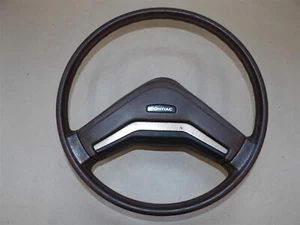VOLANTE PONTIAC J2000 SUNBIRD 1982-1987 VINILO MARRÓN CON BOTÓN BOCINA - Imagen 1 de 8
