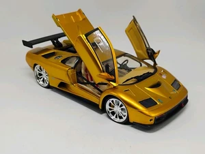 Hot Wheels Team Baurtwell Whips escala 1:18 dorado Lamborghini Diablo GTR - Imagen 1 de 14