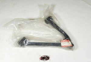 **NOS** SUZUKI Quadrunner 250 (LT 250) OEM Front lower left suspension a-arm - Picture 1 of 2