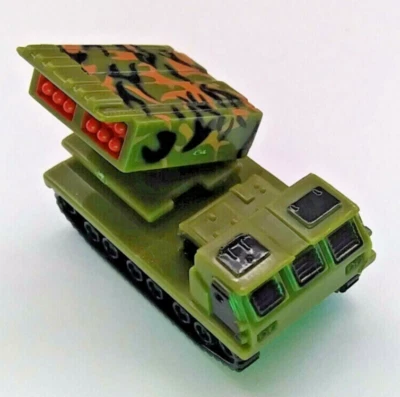 Hot Wheels Planet Micro MLRS Sistema de Cohetes de Lanzamiento Múltiple Artillería Grn Negro Bronceado Foto 1 de 4