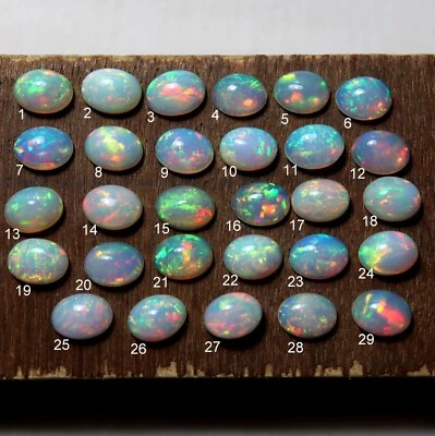 8x6 MM Natural AAA Grade Multi Fire Ethiopian Opal Oval Cabochon Wholesale Price - Image 1 of 4