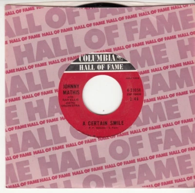 JOHNNY MATHIS - A CERTAIN SMILE/SMALL WORLD - REISSUE 45 - GREAT SHAPE - Image 1 of 2