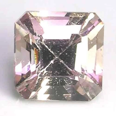 ELEGANT NATURAL VIVID PURPLISH PINK AFRICAN MALAYA GARNET - EMERALD CUT - Image 1 of 3