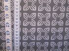 Block Flower fabric in grey 100% cotton from 'Animal Bazaar' by Michael Miller