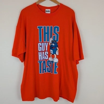 M&M's Orange This Guy Has Taste Blue M&M Character T-shirt - Image 1 of 4