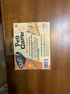 NIB. Neato Classics Peg Wood Puzzle Game 1 Playboard & 14 Pegs Blue Red Yellow - Picture 1 of 3