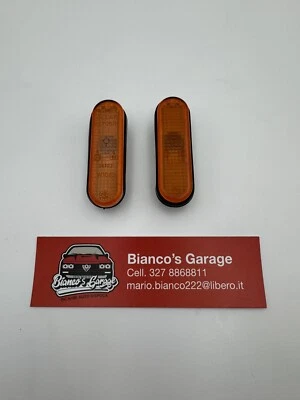 ALFA ROMEO 75 COPPIA FRECCE LATERALI NUOVE ORIGINALI - Immagine 1 di 4