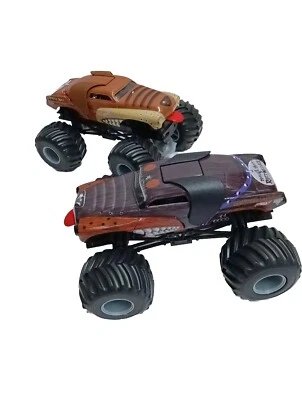 2 Hot Wheels  4 x 4 Monster Trucks Monster Mutt Rotweiler 2010 7 Inches Long -2  - Image 1 of 4