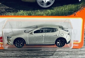 Mazda 3 2019 hatchback nuevo Matchbox Mattel tono dorado coche fundido a presión modelo nuevo en caja - Imagen 1 de 9