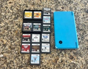BUNDLE LOT Nintendo DSi WITH 13 GAMES Agua TESTED/WORKS Stylus Charger Case! - Picture 1 of 15