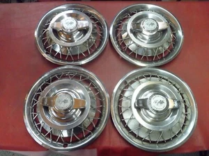 VINTAGE 1964 CHEVY NOVA CORVAIR TWO BAR WIRE SPINNER HUBCAPS WHEEL COVERS - Picture 1 of 6