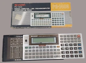Calculatrice SHARP PC-1403 pocket computer rare vintage made in Japan - Photo 1/24