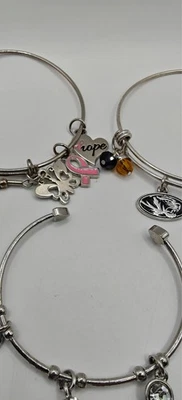 Breast Cancer Awareness Bracelet Silver and Two Other Bracelets. - Image 1 of 4