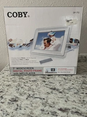 Coby DP-772 BRAND NEW 7" Widescreen Digital Photo Frame with MP3 Playback ~ - Image 1 of 4