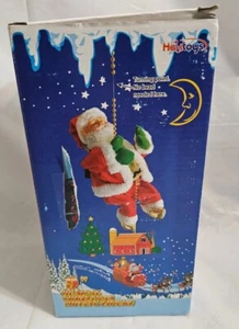 CHIMENEA ELÉCTRICA ESCALADA SANTA CLAUS JUGUETE MUSICAL 9" ESCALADA SANTA CLAUS FUNCIONA - Imagen 1 de 7