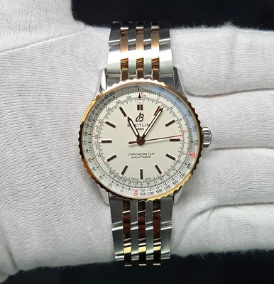 Reloj para hombre Breitling Navitimer 41 mm tono plata y oro rosa SS U17329 sin usar Foto 1 de 4