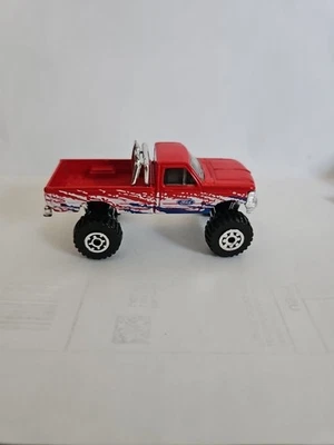 Ford F150 1993 Matchbox 4x4 rojo con pintura blanca en los laterales y calcomanía Ford en... Foto 1 de 4