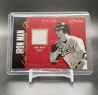 2004 Fleer Inscribed Cal Ripken Jr. /150 Names Of The Game Iron Man Patch - Image 1 of 2