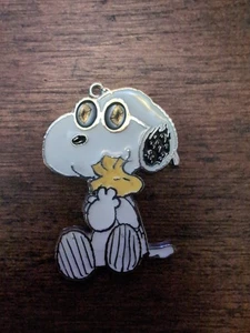 Snoopy Charm Enamel Tone Wearing Glasses Hugging Woodstock - Picture 1 of 4