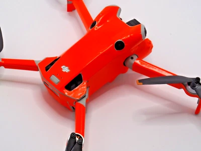 DJI Mini 4 Pro wrap, skin. In fluorescent, dayglow orange. Full body wrap. - Image 1 of 4