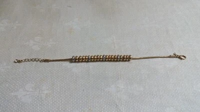 Brazalete Nina Ricci Avon GT Metal Cristal Transparente Plata Oro Disco Cuentas Cadena 8" Foto 1 de 4