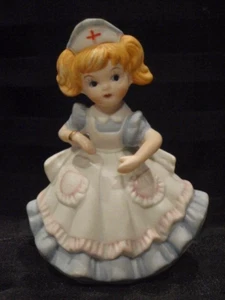 VINTAGE ENESCO GIRL NURSE FIGURINE BISQUE/PORCELAIN MADE IN TAIWAN WITH LABEL - Picture 1 of 7