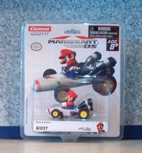 Carrera GO!!! Coche tragamonedas de carreras eléctrico escala 1:43 Mario Kart DS Mario B Dasher - Imagen 1 de 4