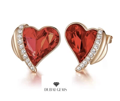 Pendientes de oro rosa con acabado corazón de rubí y diamantes creados en caja y bolso Foto 1 de 4