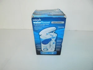 WATERPIK WATER FLOSSER ULTRA - NEW IN WORN BOX (MIQ56) - Picture 1 of 3
