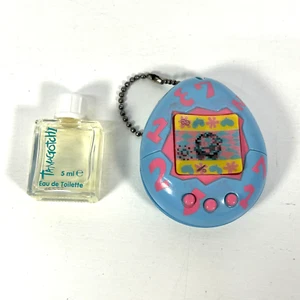 EXTRA RARE Tamagotchi Parfum Original Bandai 1996/97 for Germany - Made in Japan - Bild 1 von 6