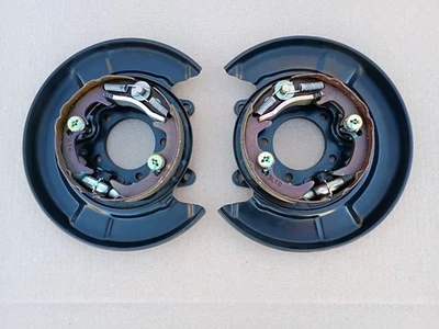 Placas de respaldo de freno de disco trasero Toyota Camry 02-06 OEM Foto 1 de 4