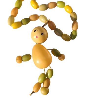 Antiguo collar de sonajero de celuloide bebé cuna juguete figura pintado a mano Foto 1 de 4