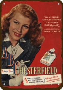 1947 Rita Hayworth Smokes Chesterfield réplica decorativa de cigarrillo letrero de metal - Imagen 1 de 1