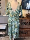 Unbranded mid length green print ruffle detailed dress size 18 to 20
