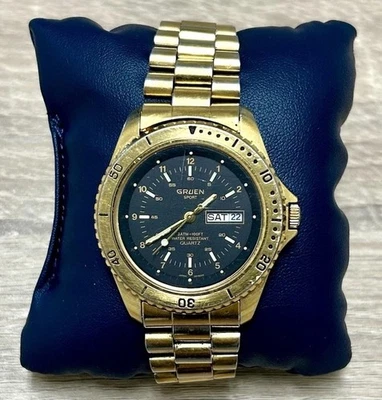 Reloj Hombre Gruen Sport Cuarzo Día Fecha Esfera Negra Tono Dorado Funcionando Foto 1 de 4