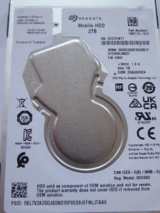 2TB Seagate ST2000LM007 SN: ZDZ PN: 1R8174-570 FW: EB01 TK AUG - NOV 2024 - Bild 1 von 7
