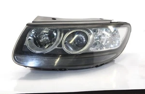 Hyundai Santa Fe 2 Scheinwerfer Frontscheinwerfer Xenon Links 92101 2B120 - Bild 1 von 5