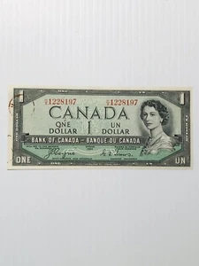 Canada 1 Dollar 1954 Devil’s Face Variety Rare AU with some Rust Marks - Picture 1 of 2