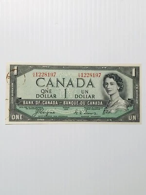 Canada 1 Dollar 1954 Devil’s Face Variety Rare AU with some Rust Marks - Image 1 of 2