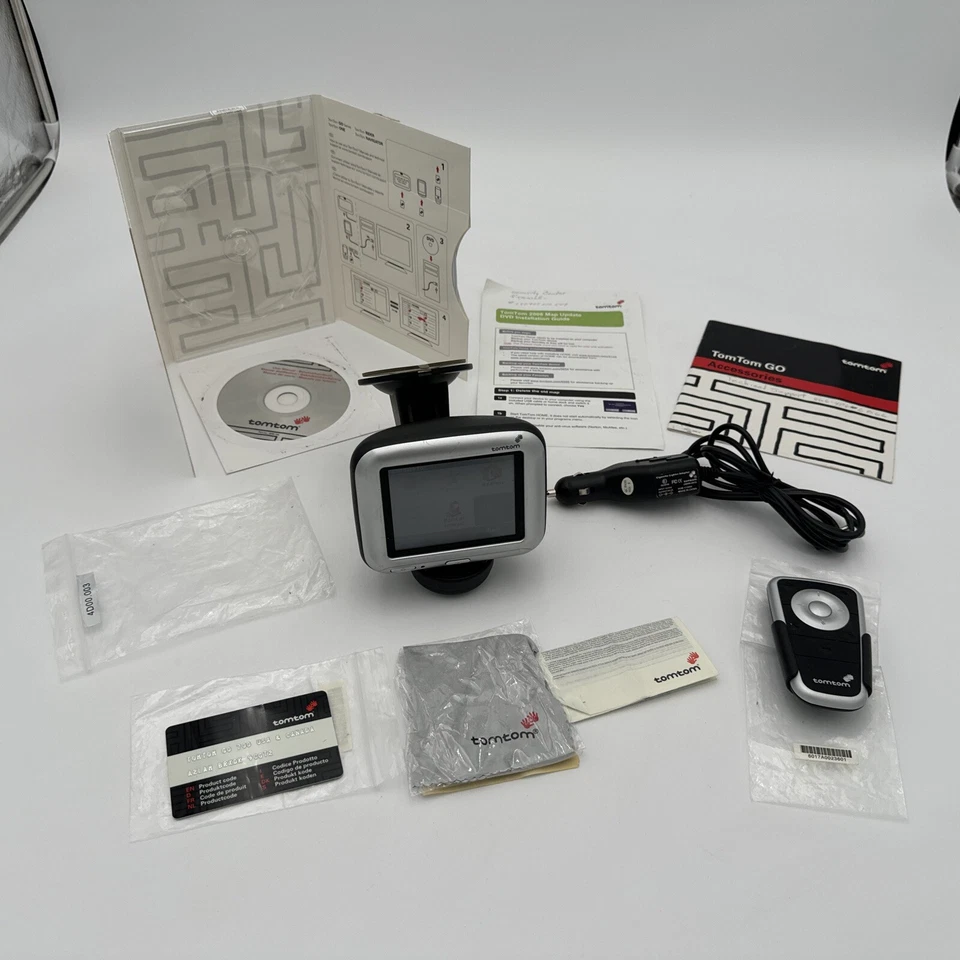 TOM TOM GO 700 GPS Bundle w/ Car Mount Charger And Remote & Wall Charger - Image 1 of 4