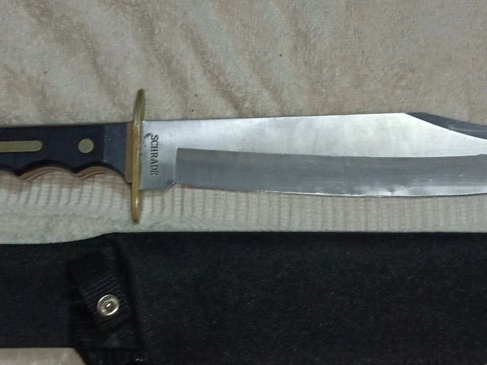 Cuchillo de hoja fija de acero inoxidable Schrade con funda Foto 1 de 3