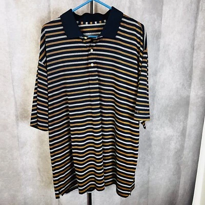 Polo de golf Greg Norman XL poliéster manga corta azul/dorado a rayas Foto 1 de 4